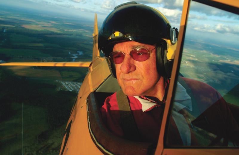 Joe Hudson flies one of his Stearman biplanes over the fields and waterways of Sussex County. KEVIN FLEMING PHOTO